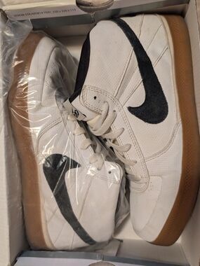 Nike White Canvas Sneakers with Black Swoosh and Gum Sole